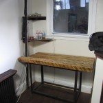 Reception desk after.  Reclaimed work bench sanded and cleaned by Sam Ball.